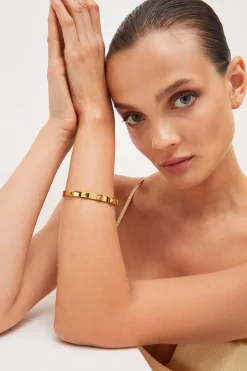 Deals ✔️ Karen Millen Gold Plated Stainless Steel Studded Bangle 🎉